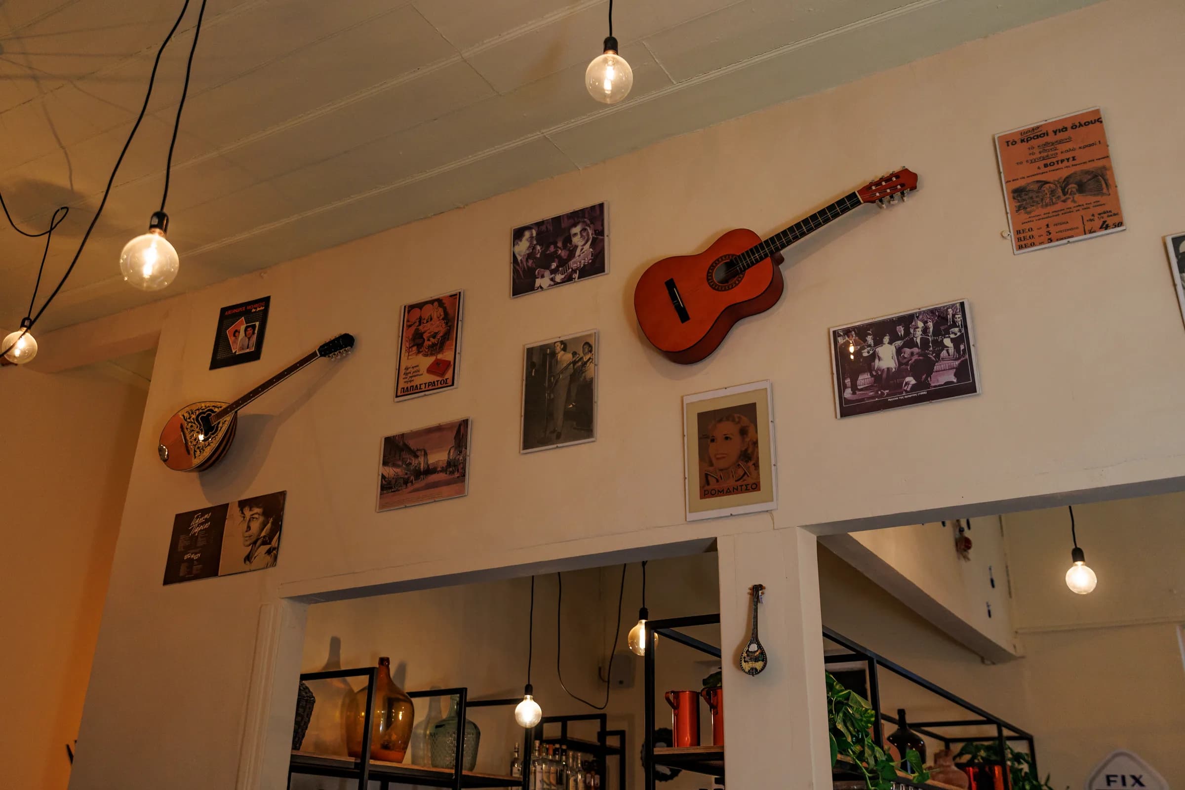 Bouzouki and guitar mounted on the interior wall