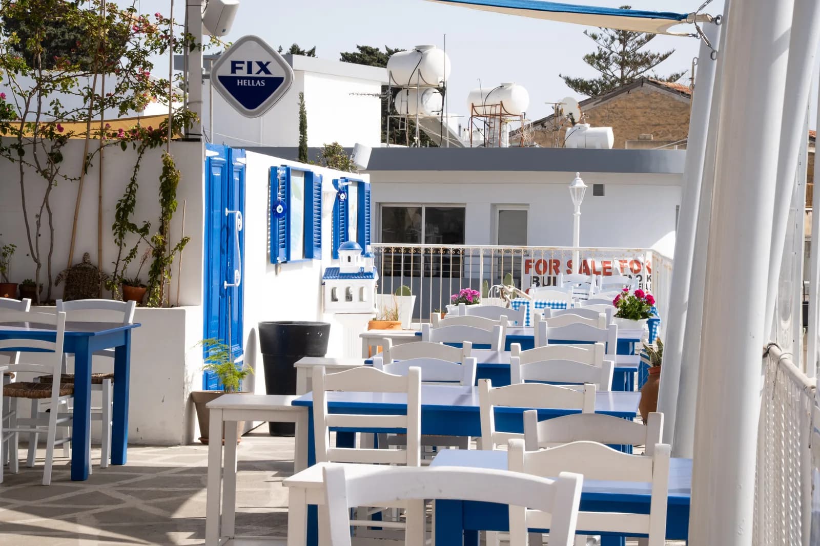 Ta Pinakia blue-and-white terrace in daylight